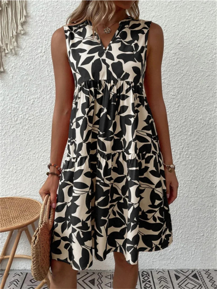 TASHA | MIDI-ROBE FLUID MIT AUSGESTELLTER SILHOUETTE