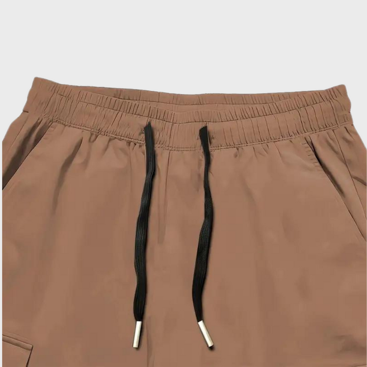 Sommerfeld™ | Herren Cargo Jogginghose – Lila Streetwear-Hose mit Reißverschlusstaschen & Bündchen
